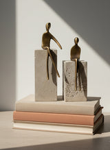 Duo Bronze Figures on Travertine Pedestals (2-Piece Set)